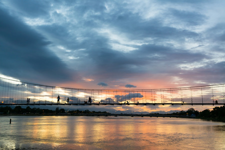 The old wooden bridge Bridge collapse Bridge across the Ping river and Wood bridge (Mon bridge )at...