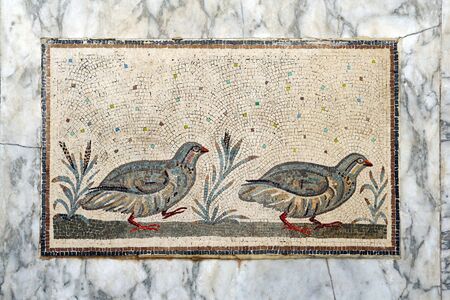 decorative mosaic with working bird
