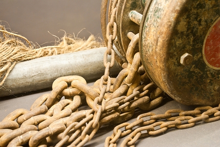 old chain and old hoisting heavy industry at wooden deck under soft light, grunge processing imageの写真素材