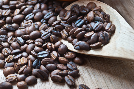 Roasted whole unground coffee beans.の写真素材