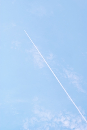 white line in blue sky and white clouds