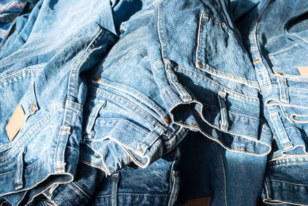 Lot of different blue jeans Blue Jeansの写真素材