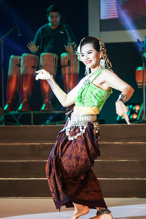 Chiang Mai, Thailand - August 29-2015 : The show, she was dancing and jars "pong lang" the folk music of the Isan region of northeast Thailand, in event "TOP THAI BRANDS" at Chiang Mai, Thailandのeditorial素材