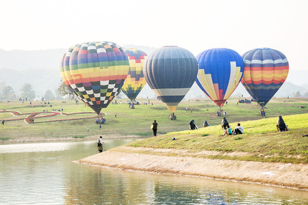 CHIANGRAI, THAILAND - FEBRUARY 14 : Hot air Balloons ready to rise into the sky in the morning at SINGHA PARK CHIANGRAI BALLOON FIESTA 2016, Chiangrai province, Thailandのeditorial素材