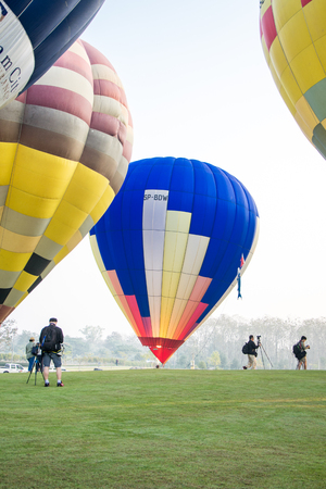 CHIANGRAI, THAILAND - FEBRUARY 15 : Hot air Balloons ready to rise into the sky in the morning at SINGHA PARK CHIANGRAI BALLOON FIESTA 2016, Chiangrai province, Thailandのeditorial素材