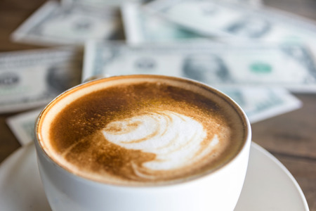 Cappuccino or latte coffee with art shape, coffee cup for backgroundの写真素材