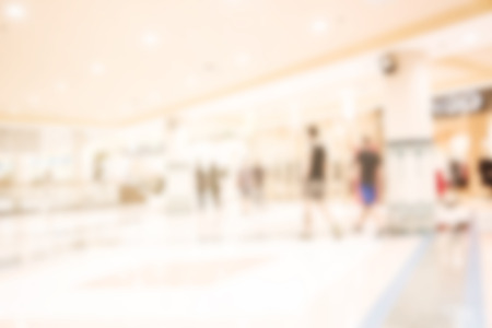 Abstract blur many people shopping in department store, Shopping mall defocused photo for banner template or backdrop, urban lifestyle conceptの写真素材
