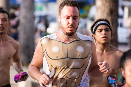 Pattaya, Thailand - May 19, 2018 - Young men and young girls competing in the most sexy outfits on the beach of Pattaya, at Pattaya Bikini Beach Race 2018 at Central Festival Pattaya beachのeditorial素材