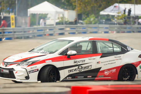 Chiangmai - November 13 : 2021, Toyota Racing car on the track road at high speed, rally sport car run fast on the road during race, high speed in Toyota Gazoo Racing Motorsport Thailand event in 700year Stadium, Chiangmai, Thailandのeditorial素材