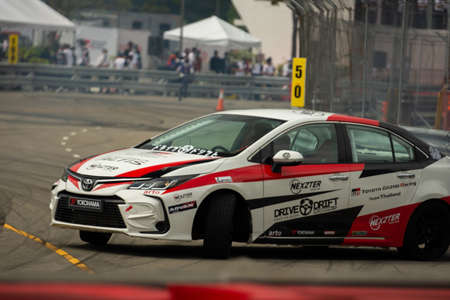 Chiangmai - November 13 : 2021, Toyota Racing car on the track road at high speed, rally sport car run fast on the road during race, high speed in Toyota Gazoo Racing Motorsport Thailand event in 700year Stadium, Chiangmai, Thailandのeditorial素材