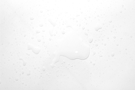 Water spill on white backgroundの写真素材