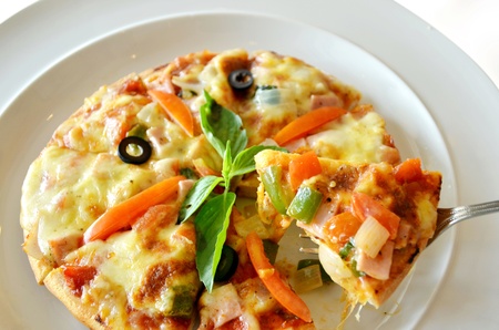 homemade pizza ,pizza on forkの写真素材