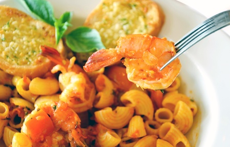 a delicious macaroni & shrimp  , shrimp on forkの写真素材