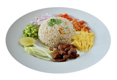 Mixed cooked rice with shrimp paste sauce and fresh vegetableの写真素材