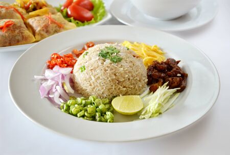 Thai food, Mixed cooked rice with shrimp paste sauce and fresh vegetableの写真素材