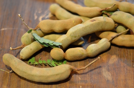 the tamarind on the wooden tableの写真素材