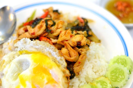 Thai food Rice and basil. Thai food, chicken ,eggs fried with chilli pepper and sweet basil.の写真素材