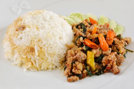 Rice and  minced pork fried with chilli pepper and  sweet basil の写真素材