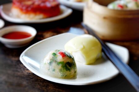crystal chives dumpling and  mini buns  on dishの写真素材