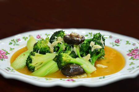 stir fry broccoli with shiitake mushroomの写真素材