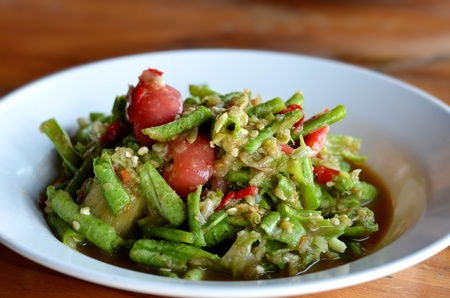 String bean spicy salad on white dishの写真素材