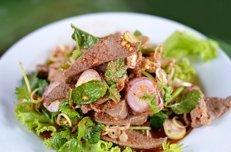mixed  fresh vegetable and steamed liver , Thai spicy saladの写真素材