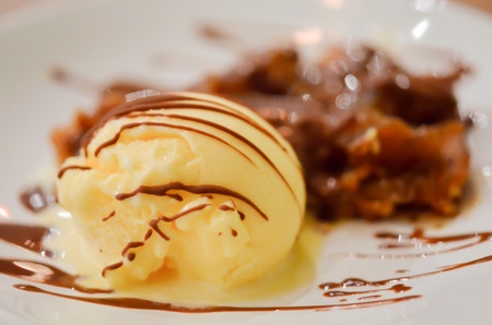 vanila ice cream served with crepe suzette and chocolate sauce