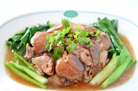 stewed pork knuckle with kale inside , chinese cuisineの写真素材