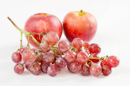 bunch of red grapes and red appleの写真素材