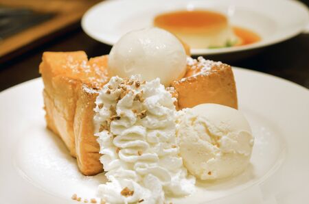 toast with ice cream and  whipping creamの写真素材
