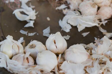 fresh garlics in a marketの写真素材