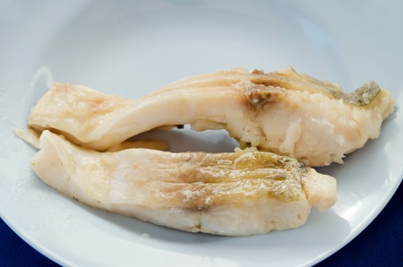 top view  fresh steam fish on blue dishの写真素材