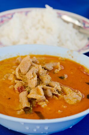  pork in ground peanut-coconut cream curry served with riceの写真素材