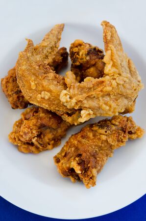 top view fried  chicken  on dish , blue backgroundの写真素材