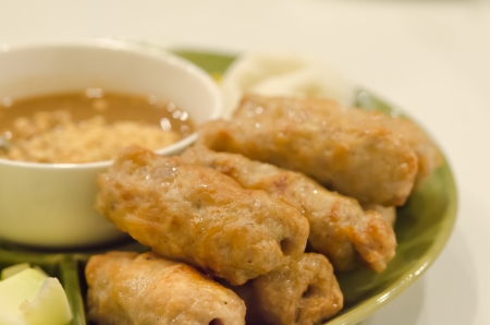 close up roasted pork served with spicy sauce and vegetable (Nam Neung)
の写真素材