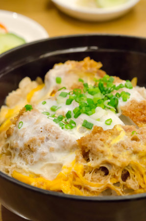 closse up  pork cutlet and egg on rice Katsudon in bowlの写真素材