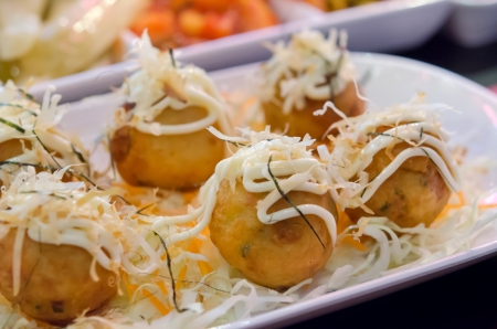 close up Takoyaki octopus balls on white plate  - Japanese foodの写真素材