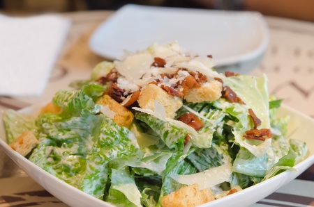 close up  caesar salad on white plate  , fresh salad  for health and delicious foodの写真素材