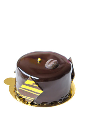 Coffee mousse cake with  dark chocolate , sweet dessert over white backgroundの写真素材