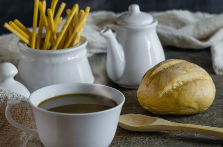 hot coffee with fresh bread on wooden table ,  still lifeの写真素材