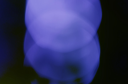 Abstract   Festive background with bokeh defocused lightsの写真素材