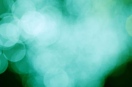 Abstract & Festive background with bokeh defocused lightsの写真素材