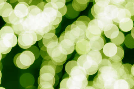 Abstract & Festive background with bokeh defocused lightsの写真素材