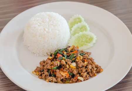 steamed  Rice topped with stir fried minced pork ,chili and  basilの写真素材