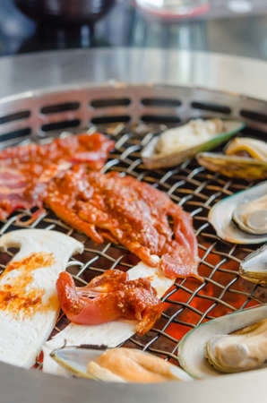 Grilled New Zealand mussels , beef and mushroomの写真素材