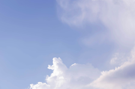 white clouds in the blue sky background