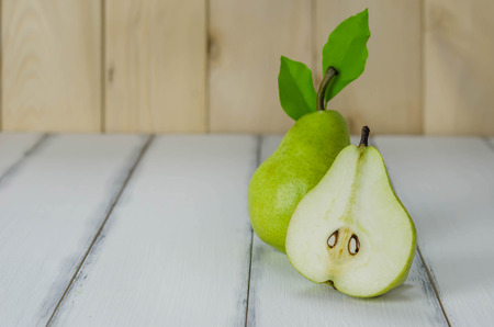Fresh pears on the wooden background , Free space for textの写真素材