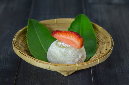 Strawberry Daifuku Mochi Japanese dessert on bamboo basket , still lifeの写真素材