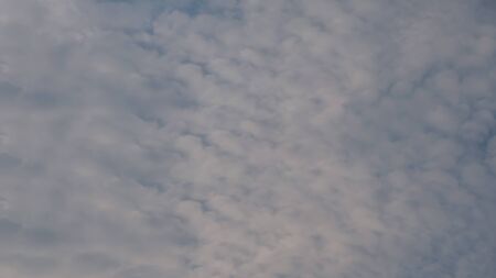 white clouds in the blue sky background