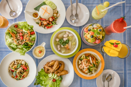 Top view full of homemade food on tableの写真素材
